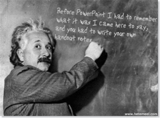 Eistein giving a blackboard presentation about PowerPoint